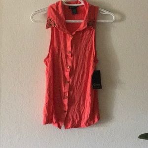 Coral Grass collection shirt.